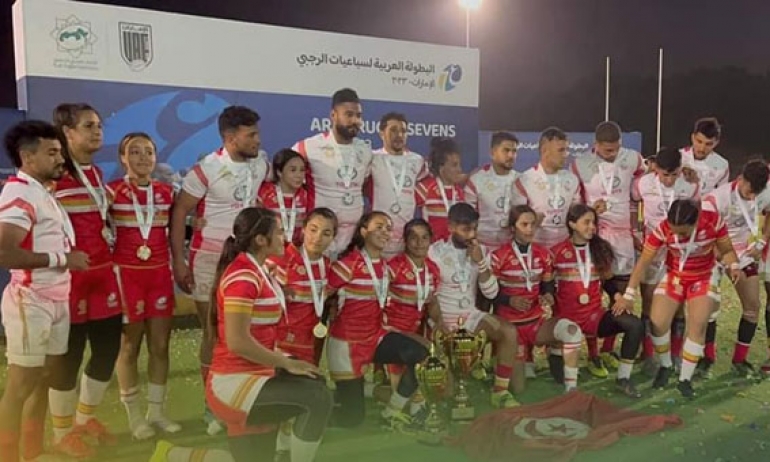 Tunisia male and female teams celebrating together.