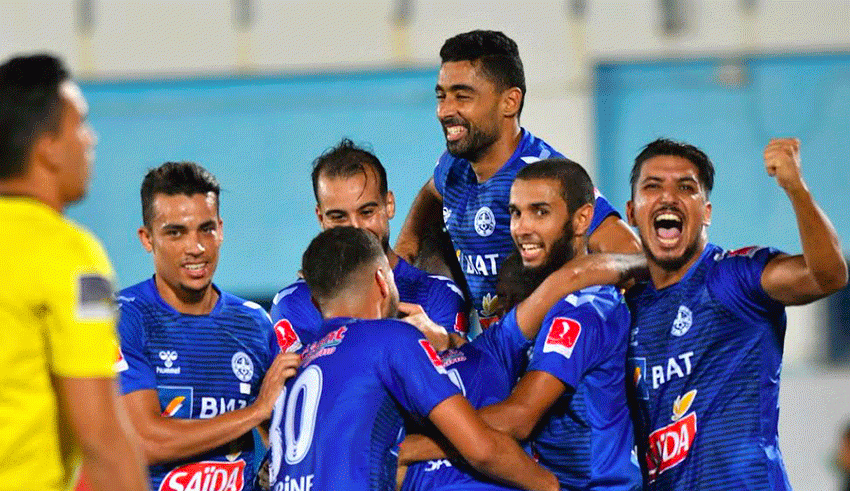 Monastir players celebrate after beating beating l'Espérance 2-0 in the final game of Tunisia's 2020 cup.